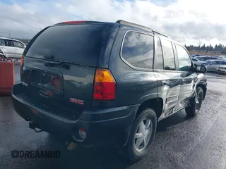 2003 GMC Envoy SLT with VIN 1GKDT13S732283859, listed as a IAAI auction lot 41219105 with 172,953 mi miles. Bid and sale history available at carsss.com. Image 4.