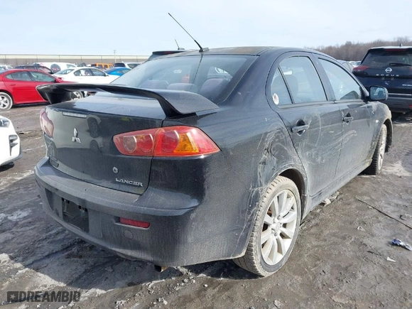 2009 Mitsubishi Lancer GTS with VIN JA3AU86W69U024424, listed as a IAAI auction lot 41504794 with 160656 miles. Bid and sale history available at carsss.com. Image 4.