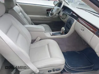 1997 Cadillac Eldorado Touring with VIN 1G6ET1293VU604921, listed as a IAAI auction lot 42113040 with 57,029 mi miles and . Bid and sale history available at DreamBid. Image 5.