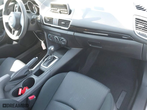 2014 Mazda Mazda3 i SV with VIN JM1BM1T77E1184656, listed as a IAAI auction lot 41703402 with 57,025 mi miles. Bid and sale history available at carsss.com. Image 5.