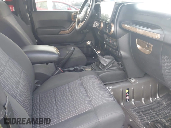 2012 Jeep Wrangler Sport z VIN 1C4AJWAG2CL286680, wystawiony jako IAAI lot #42434411 z przebiegiem 97 142 mil mil oraz . Historia ofert i sprzedaży dostępna na DreamBid. Obrazek 5.