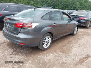 2016 Ford Focus SE z VIN 1FADP3F2XGL397092, wystawiony jako IAAI lot #42619802 z przebiegiem 232 252 mil mil oraz . Historia ofert i sprzedaży dostępna na DreamBid. Obrazek 4.