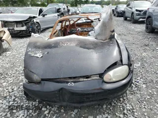1999 Mazda MX-5 Miata z VIN JM1NB3535X0131701, wystawiony jako Copart lot #55785185 z przebiegiem Nie podano mil oraz Nie do naprawy • Non repairable. Historia ofert i sprzedaży dostępna na DreamBid. Obrazek 5.