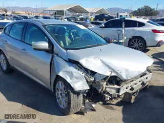 2012 Ford Focus SE with VIN 1FAHP3K27CL416859, listed as a IAAI auction lot 41418565 with 114,525 mi miles. Bid and sale history available at carsss.com. Image 1.