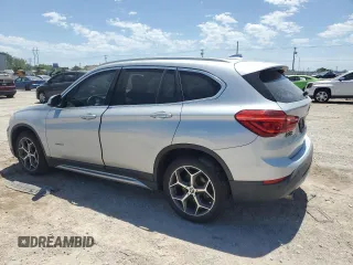 2018 BMW X1 sDrive28i z VIN WBXHU7C3XJ5H39960, wystawiony jako Copart lot #57095125 z przebiegiem 154 013 mil mil oraz Szkoda całkowita • Salvage title. Historia ofert i sprzedaży dostępna na DreamBid. Obrazek 2.
