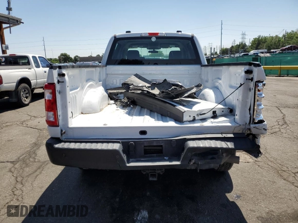 2023 Ford F-150 XL with VIN 1FTFW1E89PKD98613, listed as a Copart auction lot 61860785 with 25,568 mi miles and Salvage title. Bid and sale history available at DreamBid. Image 6.