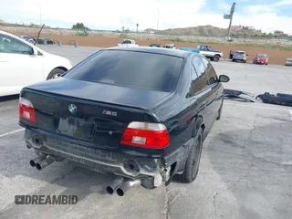 2001 BMW M5 z VIN WBSDE93421BZ99483, wystawiony jako IAAI lot #41892842 z przebiegiem 134 689 mil mil oraz . Historia ofert i sprzedaży dostępna na DreamBid. Obrazek 4.