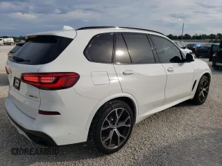 2020 BMW X5 sDrive40i with VIN 5UXCR4C02LLW63576, listed as a Copart auction lot 71912802 with 27,686 mi miles. Bid and sale history available at carsss.com. Image 3.