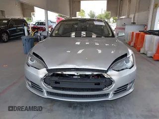 2013 Tesla Model S Performance with VIN 5YJSA1DP6DFP07999, listed as a IAAI auction lot 42284612 with 123,261 mi miles and . Bid and sale history available at DreamBid. Image 13.