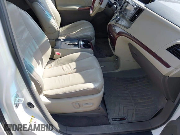 2011 Toyota Sienna XLE AAS with VIN 5TDYK3DC7BS054012, listed as a IAAI auction lot 41752182 with 123,226 mi miles and . Bid and sale history available at DreamBid. Image 5.