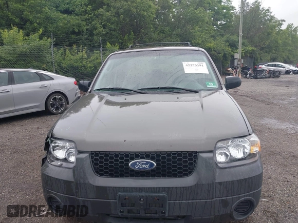 2005 Ford Escape XLS Value with VIN 1FMYU02Z75KC71339, listed as a IAAI auction lot 42373191 with 143,639 mi miles and . Bid and sale history available at DreamBid. Image 6.