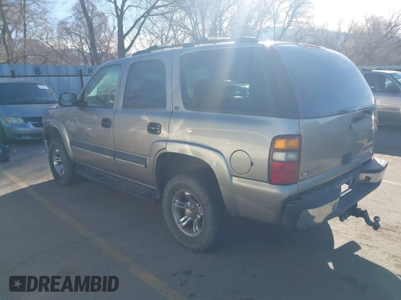 2002 Chevrolet Tahoe Z71 with VIN 1GNEK13Z32R125421, listed as a IAAI auction lot 41859011 with 216,021 mi miles. Bid and sale history available at carsss.com. Image 3.