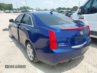 2013 Cadillac ATS Luxury z VIN 1G6AH5SX6D0155018, wystawiony jako IAAI lot #42126079 z przebiegiem 111 502 mil mil oraz . Historia ofert i sprzedaży dostępna na DreamBid. Obrazek 3.