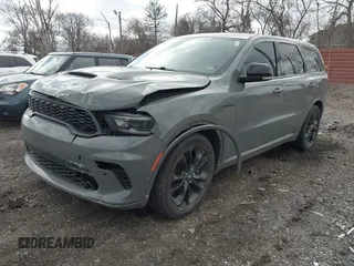 2021 Dodge Durango R/T with VIN 1C4SDJCTXMC759350, listed as a IAAI auction lot 41744877 with 85,839 mi miles and . Bid and sale history available at DreamBid. Image 2.