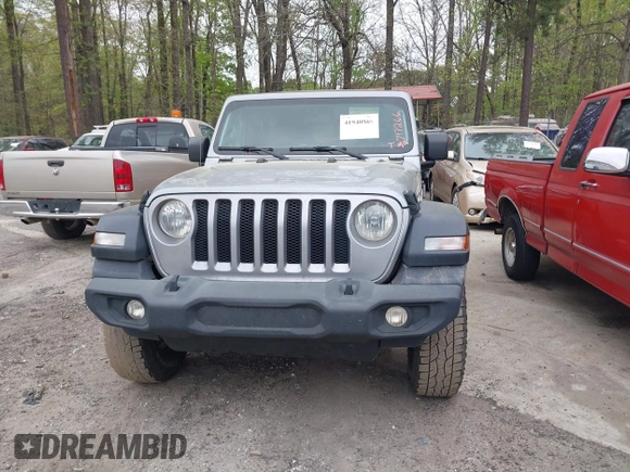 2021 Jeep Wrangler Unlimited Sport S with VIN 1C4HJXDN3MW717266, listed as a IAAI auction lot 41940869 with 113,386 mi miles. Bid and sale history available at carsss.com. Image 12.