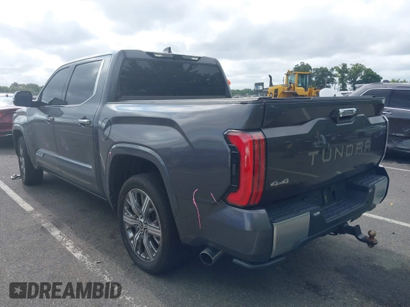 2022 Toyota Tundra Capstone Hybrid with VIN 5TFVC5DB4NX011801, listed as a IAAI auction lot 40218851 with 43,736 mi miles and . Bid and sale history available at DreamBid. Image 3.