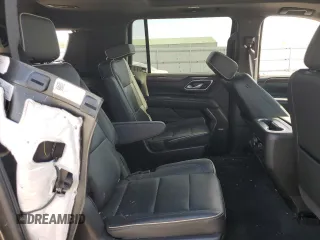 2021 Chevrolet Suburban Premier with VIN 1GNSKFKD5MR155061, listed as a Copart auction lot 42753603 with 58,689 mi miles and . Bid and sale history available at DreamBid. Image 11.