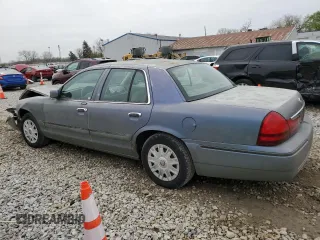 2004 Mercury Grand Marquis GS with VIN 2MEFM74W44X659873, listed as a Copart auction lot 51793205 with 115,384 mi miles and Salvage Title. Bid and sale history available at DreamBid. Image 2.