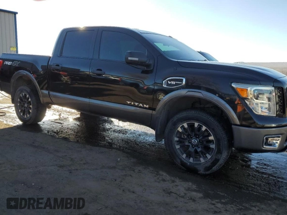 2017 Nissan Titan SV with VIN 1N6AA1E59HN509950, listed as a Copart auction lot 42231085 with 143,746 mi miles and Salvage Title. Bid and sale history available at DreamBid. Image 4.