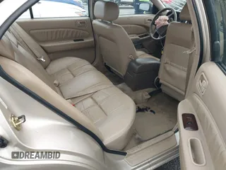 1995 Nissan Maxima GLE z VIN JN1CA21DXST075946, wystawiony jako IAAI lot #41669451 z przebiegiem 154 423 mil mil oraz . Historia ofert i sprzedaży dostępna na DreamBid. Obrazek 8.