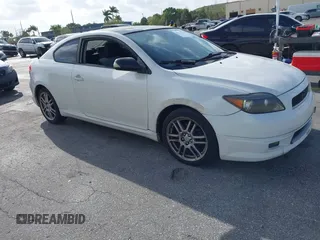 2007 Scion tC Spec with VIN JTKDE167370212813, listed as a IAAI auction lot 41719702 with 137,308 mi miles. Bid and sale history available at carsss.com. Image 1.