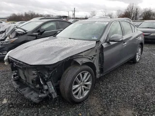 2017 Infiniti Q50 2.0t Premium with VIN JN1CV7AR9HM682291, listed as a Copart auction lot 84290424 with 67,981 mi miles and Salvage Title. Bid and sale history available at carsss.com. Image 1.