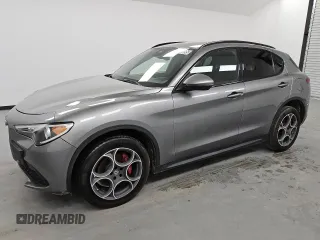 2018 Alfa Romeo Stelvio Ti Sport z VIN ZASFAKNN9J7B73006, wystawiony jako Copart lot #50375995 z przebiegiem 73 199 mil mil oraz Czysty tytuł • Clean title. Historia ofert i sprzedaży dostępna na DreamBid. Obrazek 1.