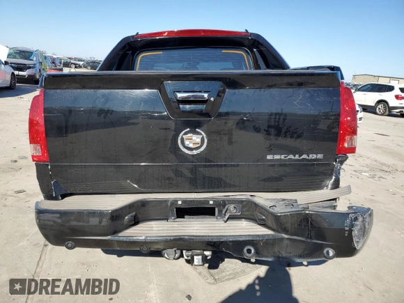 2004 Cadillac Escalade EXT z VIN 3GYEK62N74G276912, wystawiony jako Copart lot #86008284 z przebiegiem Nie podano mil oraz Szkoda całkowita • Salvage title. Historia ofert i sprzedaży dostępna na DreamBid. Obrazek 6.