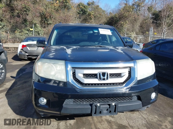 2010 Honda Pilot Touring with VIN 5FNYF4H95AB030531, listed as a IAAI auction lot 41441088 with 274,185 mi miles and . Bid and sale history available at carsss.com. Image 12.