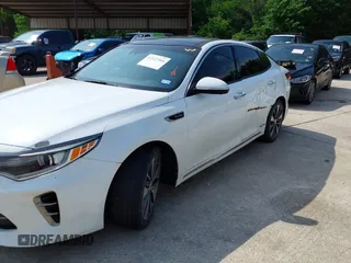 2016 Kia Optima SXL Turbo with VIN 5XXGV4L26GG015874, listed as a IAAI auction lot 42127366 with 166,970 mi miles. Bid and sale history available at carsss.com. Image 6.