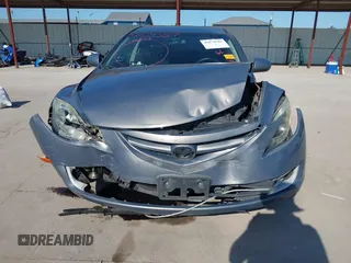 2011 Mazda 6 i Grand Touring with VIN 1YVHZ8CHXB5M27937, listed as a IAAI auction lot 42574587 with 203,952 mi miles and . Bid and sale history available at DreamBid. Image 6.