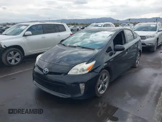 2013 Toyota Prius One with VIN JTDKN3DU4D5617063, listed as a IAAI auction lot 41461279 with 247,219 mi miles. Bid and sale history available at carsss.com. Image 2.