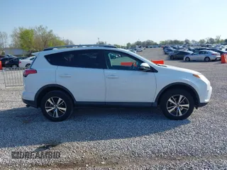 2018 Toyota RAV4 XLE with VIN 2T3WFREV2JW412970, listed as a IAAI auction lot 41986122 with 61,828 mi miles. Bid and sale history available at carsss.com. Image 13.