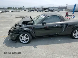 2000 Toyota MR2 z VIN JTDFR3200Y0006035, wystawiony jako Copart lot #56325275 z przebiegiem 143 879 mil mil oraz Szkoda całkowita • Salvage title. Historia ofert i sprzedaży dostępna na DreamBid. Obrazek 13.