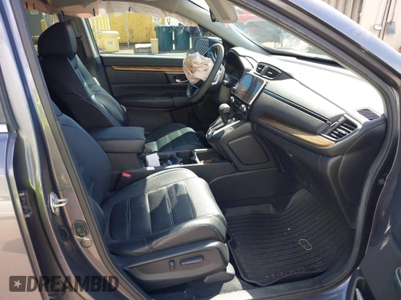 2018 Honda CR-V Touring with VIN 7FARW1H90JE030766, listed as a IAAI auction lot 41637900 with Not Provided miles and . Bid and sale history available at DreamBid. Image 5.