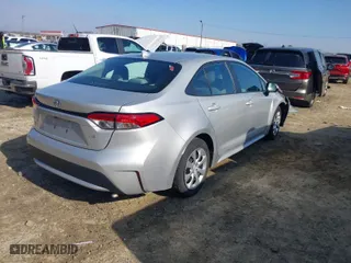 2021 Toyota Corolla LE with VIN 5YFEPMAE2MP187465, listed as a IAAI auction lot 41482849 with 98,817 mi miles. Bid and sale history available at carsss.com. Image 4.