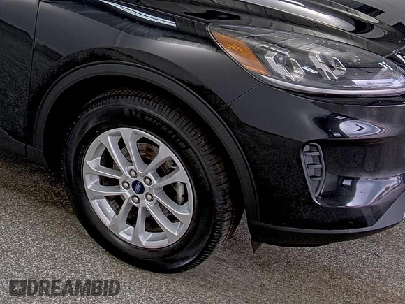 2021 Ford Escape SE with VIN 1FMCU9G64MUA42925, listed as a IAAI auction lot 42858756 with 79,685 mi miles and . Bid and sale history available at DreamBid. Image 14.