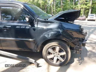 2013 Honda Pilot Touring with VIN 5FNYF3H96DB011470, listed as a IAAI auction lot 42535022 with 201,380 mi miles and . Bid and sale history available at DreamBid. Image 18.