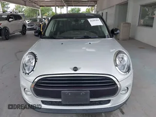 2019 MINI Hardtop 4 Door Cooper z VIN WMWXU1C59K2J02305, wystawiony jako IAAI lot #42205461 z przebiegiem 75 101 mil mil oraz . Historia ofert i sprzedaży dostępna na DreamBid. Obrazek 12.