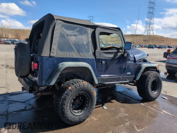 1997 Jeep Wrangler SE z VIN 1J4FY29P1VP441353, wystawiony jako Copart lot #51691545 z przebiegiem Nie podano mil oraz Szkoda całkowita • Salvage title. Historia ofert i sprzedaży dostępna na DreamBid. Obrazek 3.