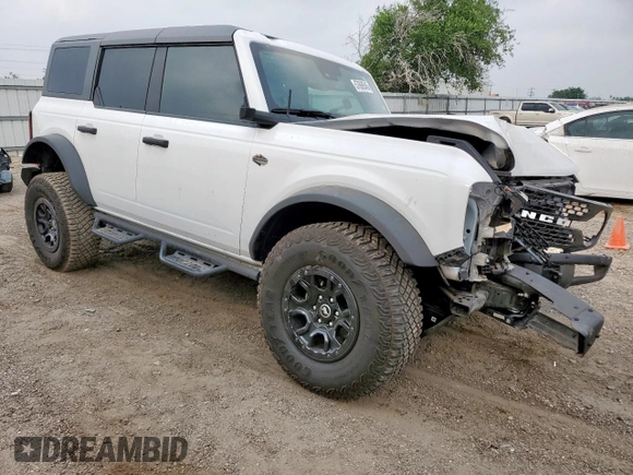 2024 Ford Bronco Wildtrak z VIN 1FMEE2BP4RLA19493, wystawiony jako Copart lot #57669545 z przebiegiem 12 065 mil mil oraz Szkoda całkowita • Salvage title. Historia ofert i sprzedaży dostępna na DreamBid. Obrazek 4.