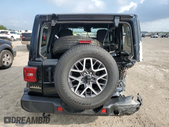 2024 Jeep Wrangler Sahara with VIN 1C4PJXEG8RW262661, listed as a Copart auction lot 55464325 with 561 mi miles and Salvage title. Bid and sale history available at DreamBid. Image 6.