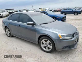 2014 Volkswagen Jetta TDI w/Premium with VIN 3VWLL7AJ9EM267112, listed as a Copart auction lot 58163545 with 106,367 mi miles and Clean title. Bid and sale history available at DreamBid. Image 4.