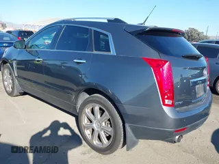 2013 Cadillac SRX Premium Collection z VIN 3GYFNEE37DS525612, wystawiony jako IAAI lot #41344221 z przebiegiem 119 573 mil mil oraz . Historia ofert i sprzedaży dostępna na DreamBid. Obrazek 3.