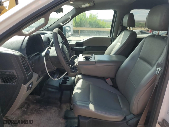 2016 Ford F-150 XLT with VIN 1FTFW1EG9GKE77383, listed as a Copart auction lot 52525155 with 125,570 mi miles and Clean Title. Bid and sale history available at carsss.com. Image 7.