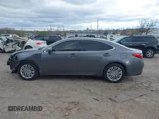 2013 Lexus ES 4dr Sdn with VIN JTHBK1GG0D2074698, listed as a IAAI auction lot 42049070 with 117,036 mi miles. Bid and sale history available at carsss.com. Image 13.