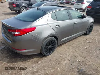 2012 Kia Optima SX with VIN 5XXGR4A62CG010028, listed as a IAAI auction lot 41942271 with 227,080 mi miles and . Bid and sale history available at carsss.com. Image 4.
