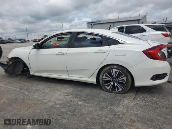 2016 Honda Civic EX-L с VIN 2HGFC1F74GH650713, выставлен на аукционе Copart как лот 58959515 с пробегом Не указан миль и Списание • Salvage title. История ставок и продаж доступна на DreamBid. Изображение 2.