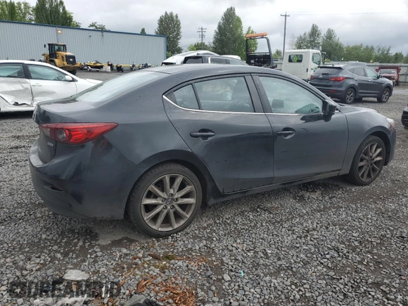 2017 Mazda 3 Touring with VIN JM1BN1V7XH1143503, listed as a Copart auction lot 58628085 with 181,345 mi miles and Salvage title. Bid and sale history available at DreamBid. Image 3.