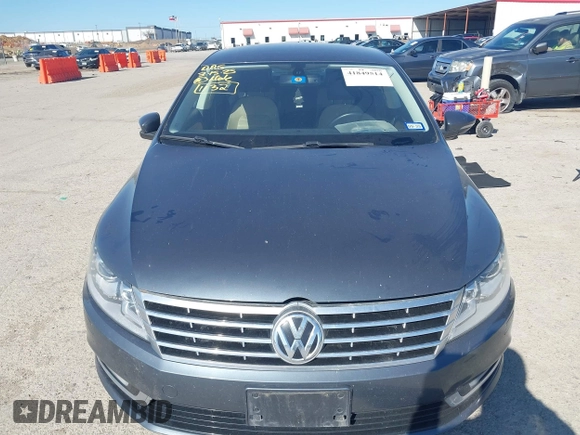 2013 Volkswagen CC Sport with VIN WVWBN7AN0DE551132, listed as a IAAI auction lot 41849514 with 144,557 mi miles. Bid and sale history available at carsss.com. Image 12.